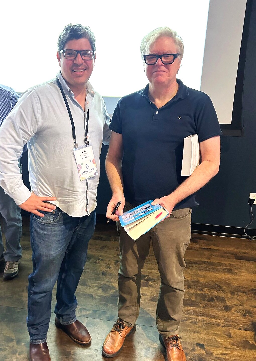 Getting my copy of the blue book signed by Eric Evans at Explore DDD 2026